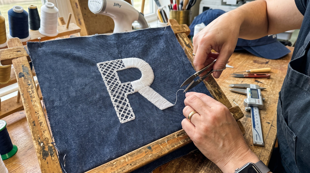 What Is Embroidery Underlay Stitch? The Invisible Rebar Behind Flawless Cap Lettering