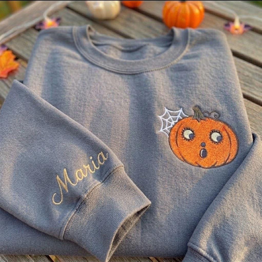 Custom Pumpkin Embroidered Sweatshirt, Spooky Spider Web Sleeve Name Halloween Crewneck