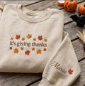 Custom It's Giving Thanks Sweatshirt, Thanksgiving Maple Leaves Sleeve Name Crewneck