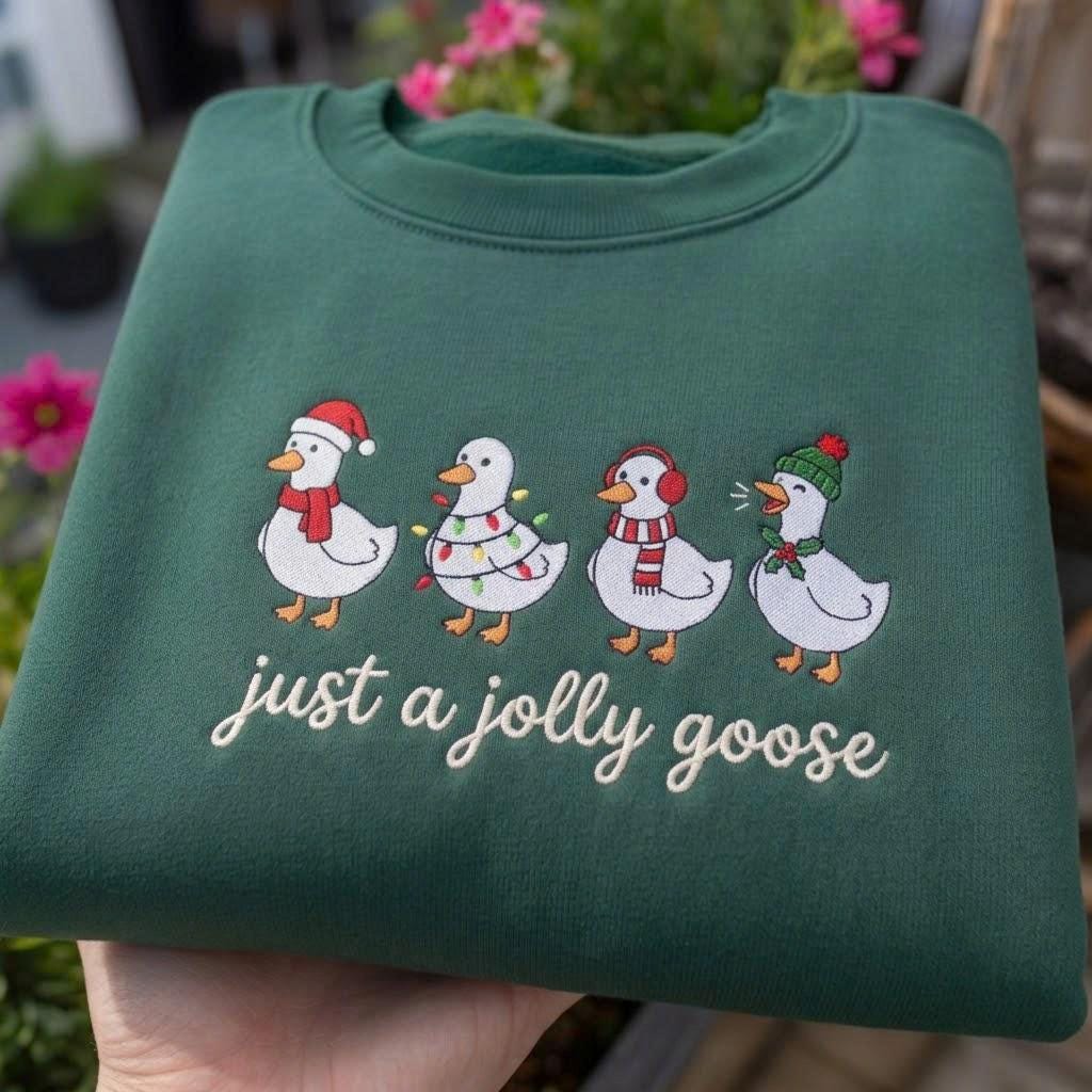 Just A Jolly Goose Christmas Sweatshirt, Green Winter Village Embroidered Crewneck