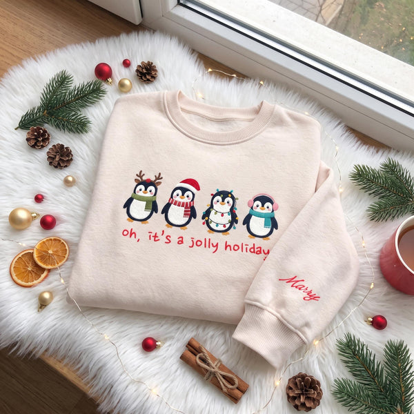 Embroidered Christmas Cute Penguins Sweatshirt, Custom Sleeve Name Oh It's a Jolly Holiday Shirt, Festive Gift Cute Xmas Winter Crewneck