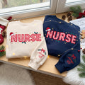Embroidered Christmas Nurse Sweatshirt, Custom Name Sleeve Santa Hat Gingham Nurse Shirt, RN Xmas Gift, Healthcare Worker Holiday Crewneck