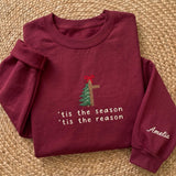 Tis The Reason Christmas Cross Sweatshirt, Custom Sleeve Name Embroidered Crewneck